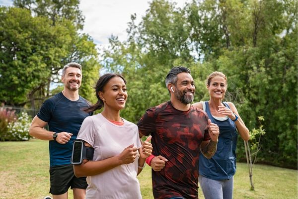 First-time marathoners running at Borneo International Marathon with scenic backdrop