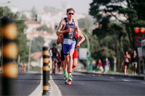Runner wearing a GPS watch and proper running gear