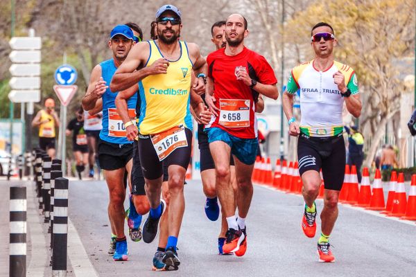 Marathon runner pushing through the wall to complete the run