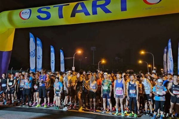 Runners preparing at the starting line in Kota Kinabalu for Borneo Marathon